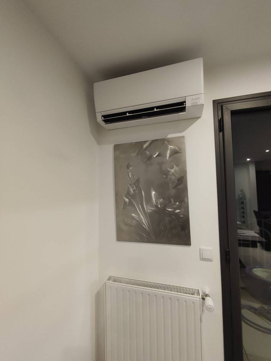 Installation d'une climatisation double monosplit Mitsubishi Electric dans un appartement à Saint-Maur des Fossés